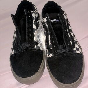 Brand new vans with no box. Black and black checkered. Black check classic vans